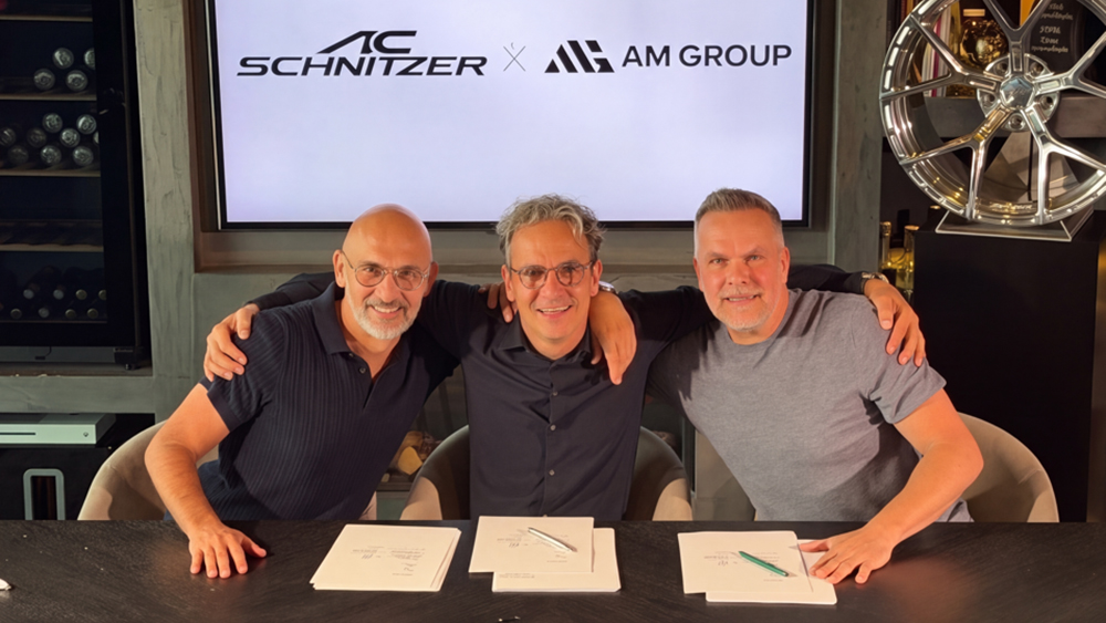 Executives from AM Group and AC Schnitzer sitting at table