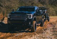 GMC truck towing ATV