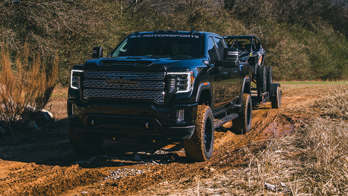 GMC truck towing ATV