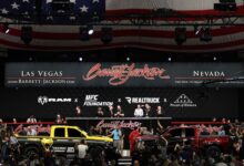 Barrett-Jackson Las Vegas Auction vehicles on stage with crowd