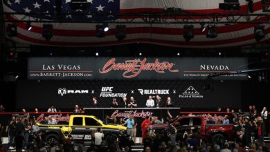 Barrett-Jackson Las Vegas Auction vehicles on stage with crowd