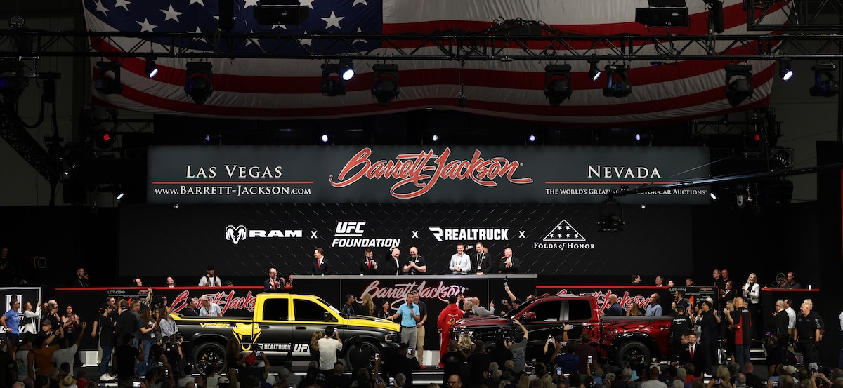 Barrett-Jackson Las Vegas Auction vehicles on stage with crowd