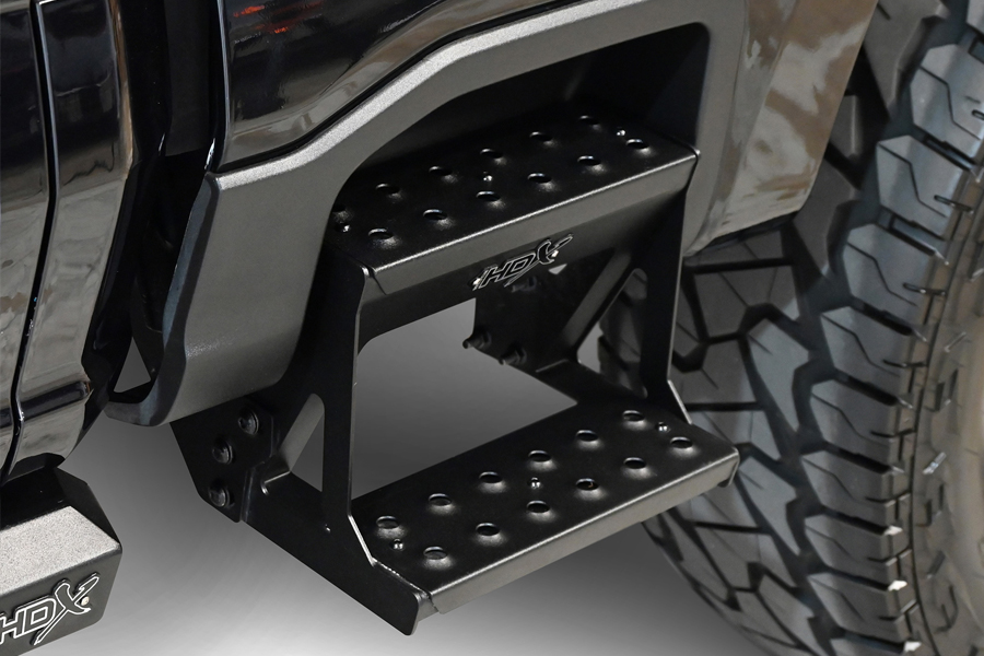 The new Westin HDX Drop Side Bed Step mounted on truck