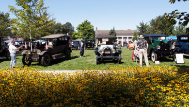 Old Car Festival with people and antique cars on lawn