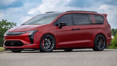Red Pacifica project vehicle built by Chrysler and VANkuture side view outdoors