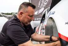 Scott Dolfi working on car