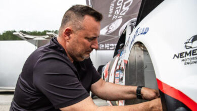 Scott Dolfi working on car
