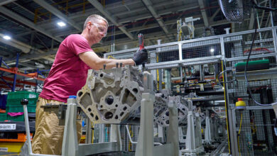 A worker at GM’s Flint Engine Operations, where the all-new Gen-6 5.7L and 6.6L V8s are assembled.