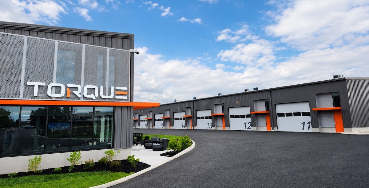torque motor suites track and buildings with sign