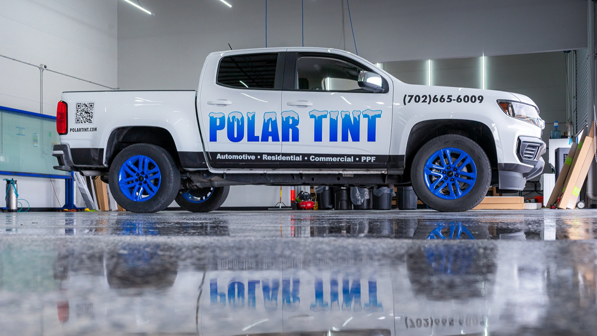 White truck with Polar Tint logo