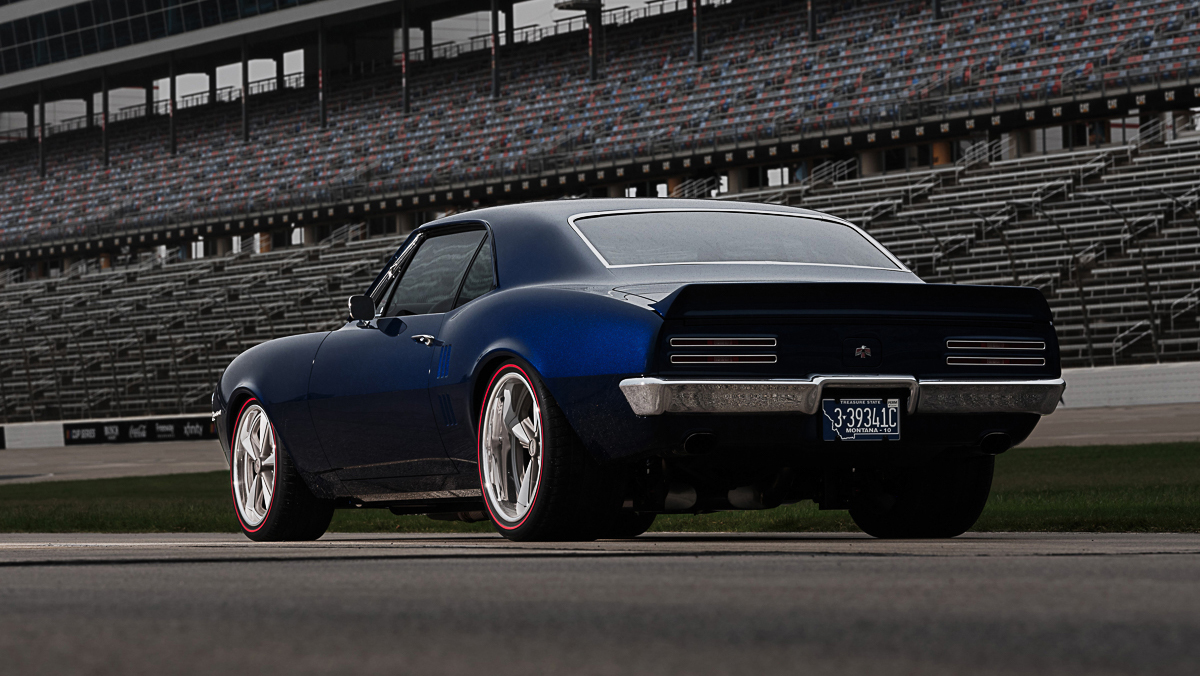 1967 Pontiac Firebird parked on racetrack from rear