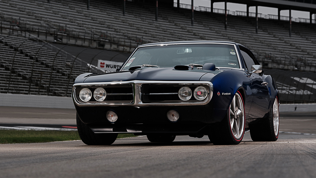 1967 Pontiac Firebird parked on racetrack from front