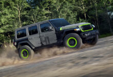 2027 Jeep Wrangler Switchback driving up hill