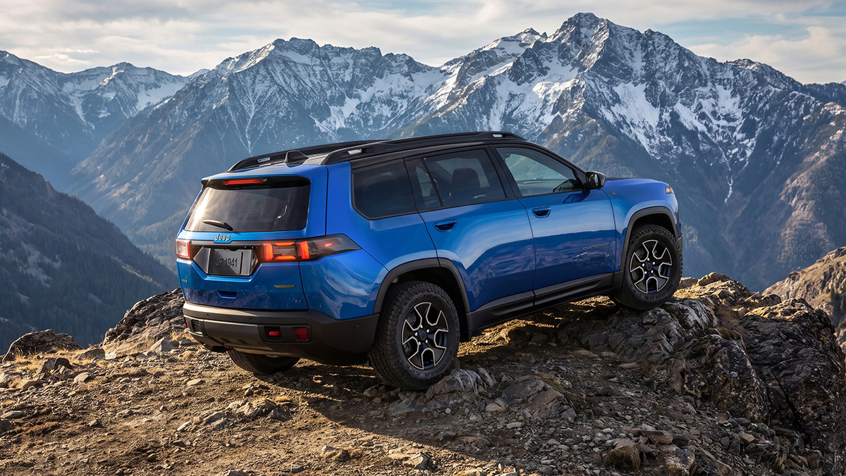 The 2027 Jeep Cherokee Trailhawk climbing a trail.