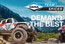 Custom Jeeps on rocky terrain with Dana logo
