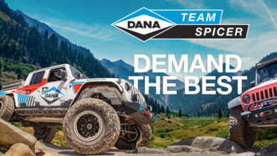 Custom Jeeps on rocky terrain with Dana logo