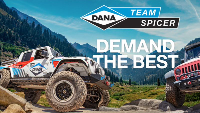 Custom Jeeps on rocky terrain with Dana logo