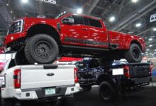 customer relationships red truck stacked on two truck beds