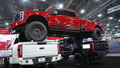 customer relationships red truck stacked on two truck beds