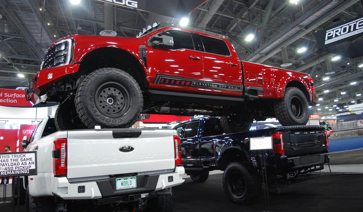 customer relationships red truck stacked on two truck beds