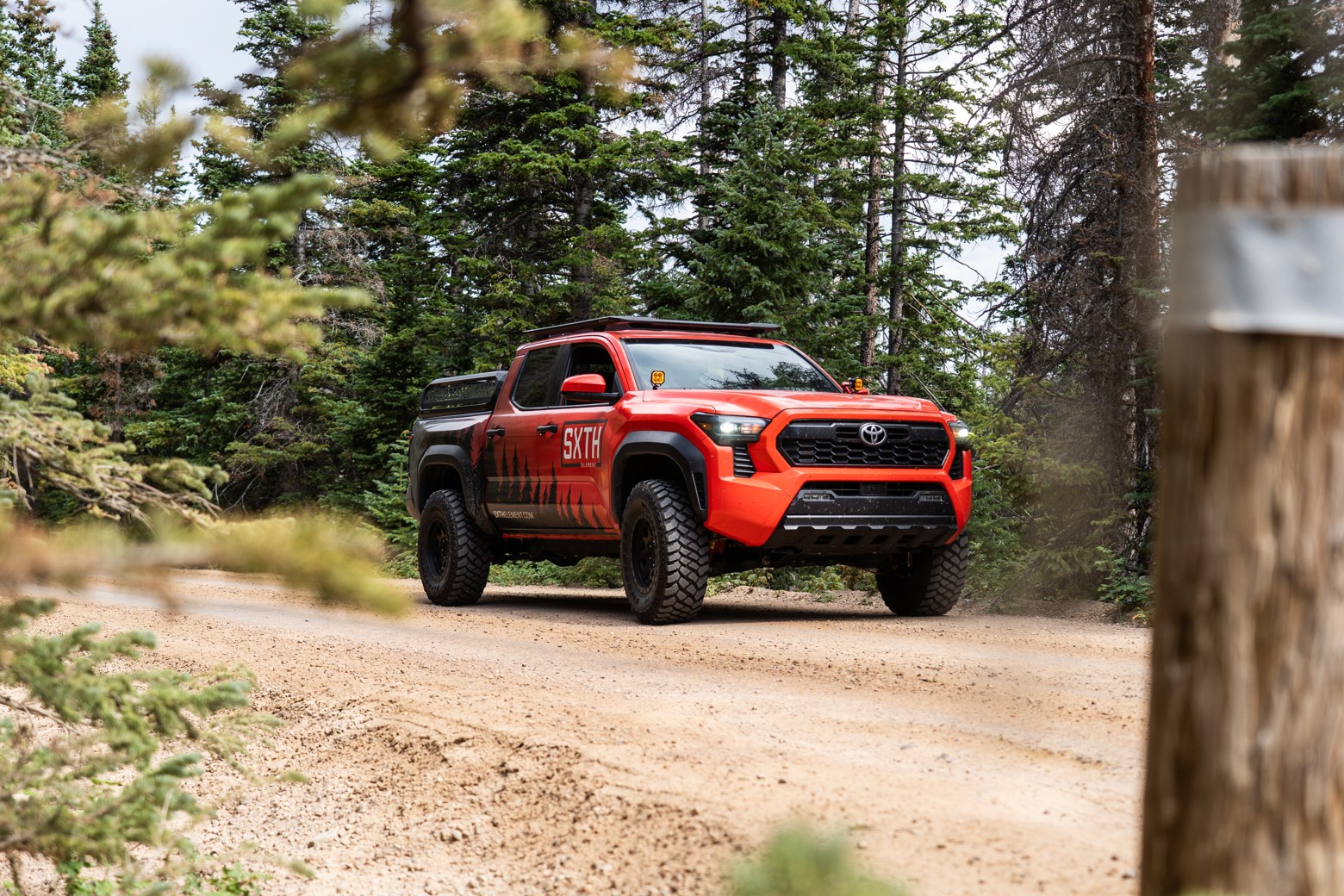 Holley Performance Brands SXTH Element, red and black Toyota on trail