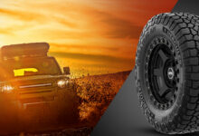 Off-road vehicle driving though mud