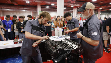 Students at AAPEX rebuilding V-8 engine