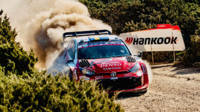 Rally car kicking up dust
