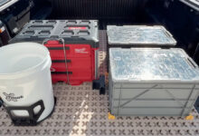 Tmat installed in bed of truck with boxes and bucket secured in place