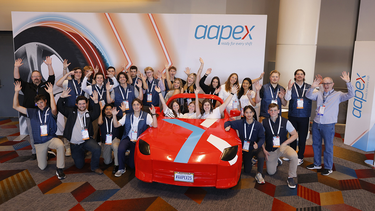 Northwood Students in and around AAPEX car