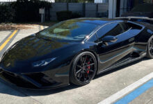 Black car in parking lot