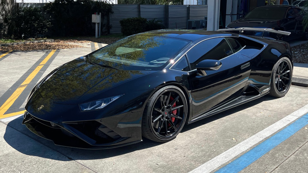 Black car in parking lot