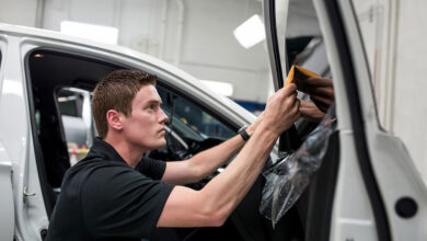 Person tinting car window